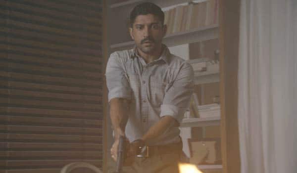 Farhan-Akhtar-picks-up-the-gun-for-the-first-time-in-Wazir