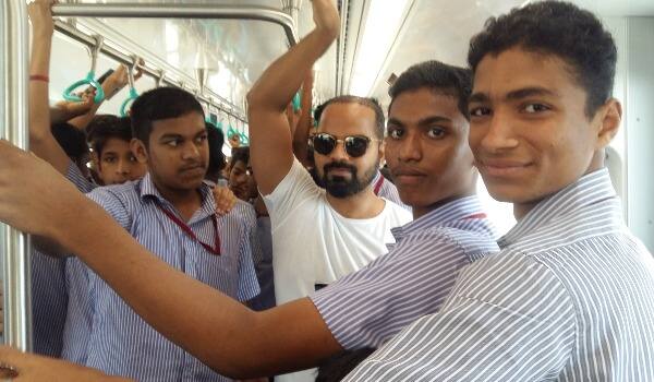 Vinay-port-travelled-in-metro-with-students