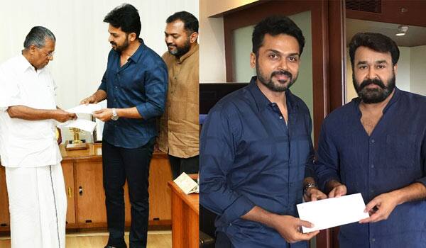 Karthi-handedover-Rs.25-Lakhs-cheque-to-Kerala-Chief-minister