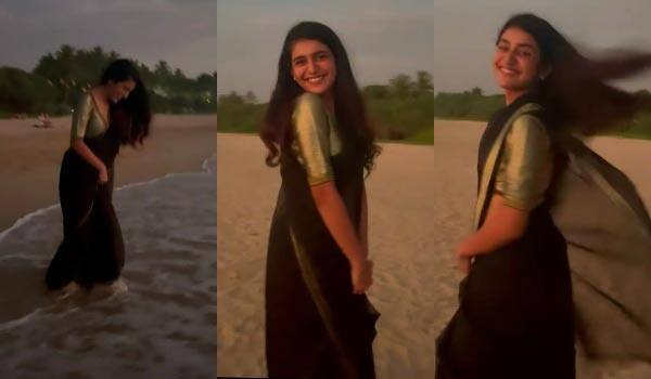 Priya-Warrior-wearing-a-saree-and-walking-on-the-beach